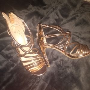 Size 6.5, a gold color
